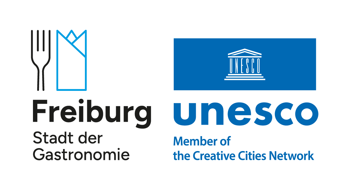logos UNESCO und Freiburg Creative City